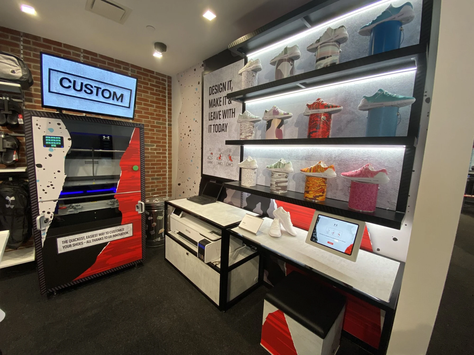 Under Armour in-store customisation studio: the design station and a wall of custom shoes